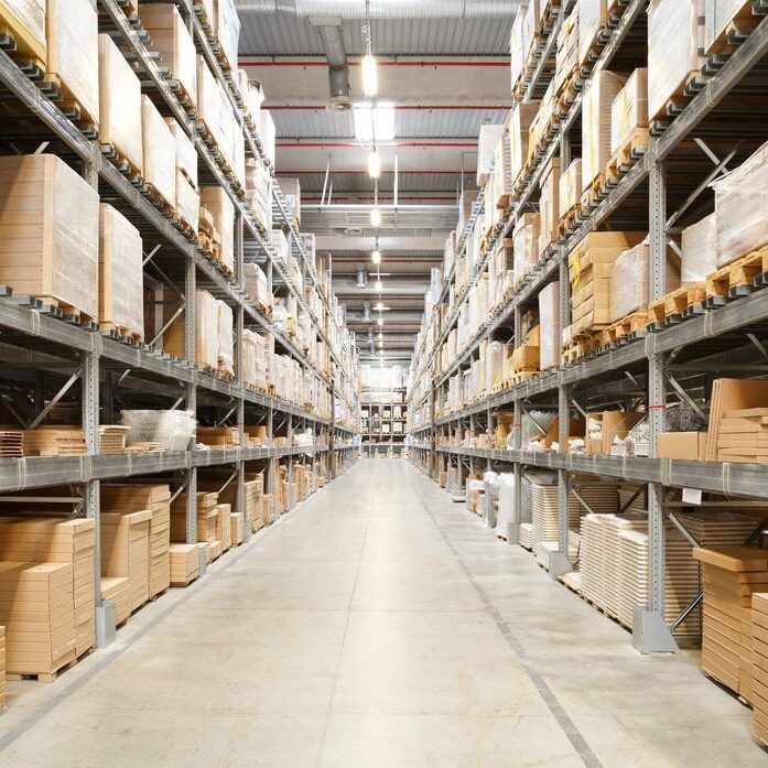 A warehouse filled with lots of shelves full of boxes.